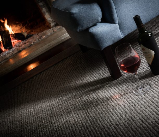 Detail zacht vloerkleed van 100% wol in woonkamer