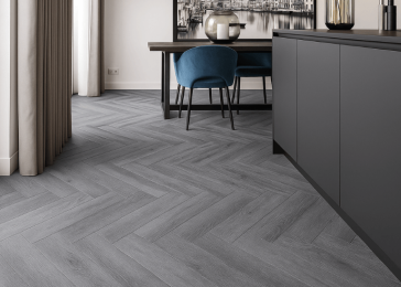 Grijze visgraat pvc-vloer in moderne zwarte keuken